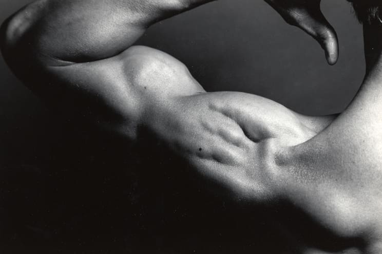 4. Dianora Niccolini (American, b. Italy, b. 1936), Diptych of Male Nude Flexing Shoulder Muscles (left), photograph, Gift of the artist in memory of Elaine Augsbury Niccolini